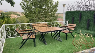 صندلی باغی چوبی فلزی دنیز: استحکام، زیبایی و راحتی برای فضای باز شما